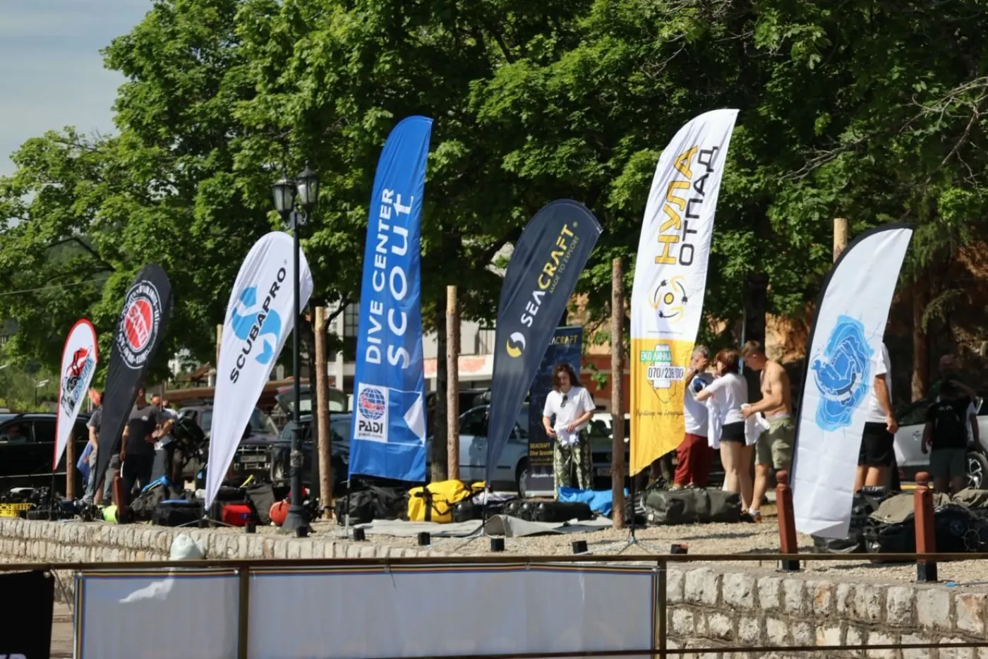 Participant flags — Dive Center Scout, Scubapro, Seacraft, and Nula Otpad at the Kalishta action